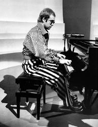 Without Elton John I would not play piano while singing nor have any performance experience